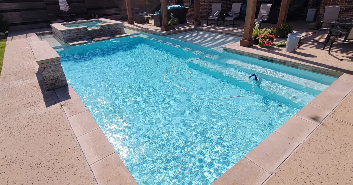 Pool steps and tile used for calcium hardness guidance
