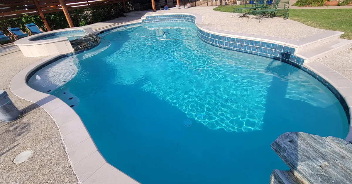 Clear backyard pool used to estimate pool volume